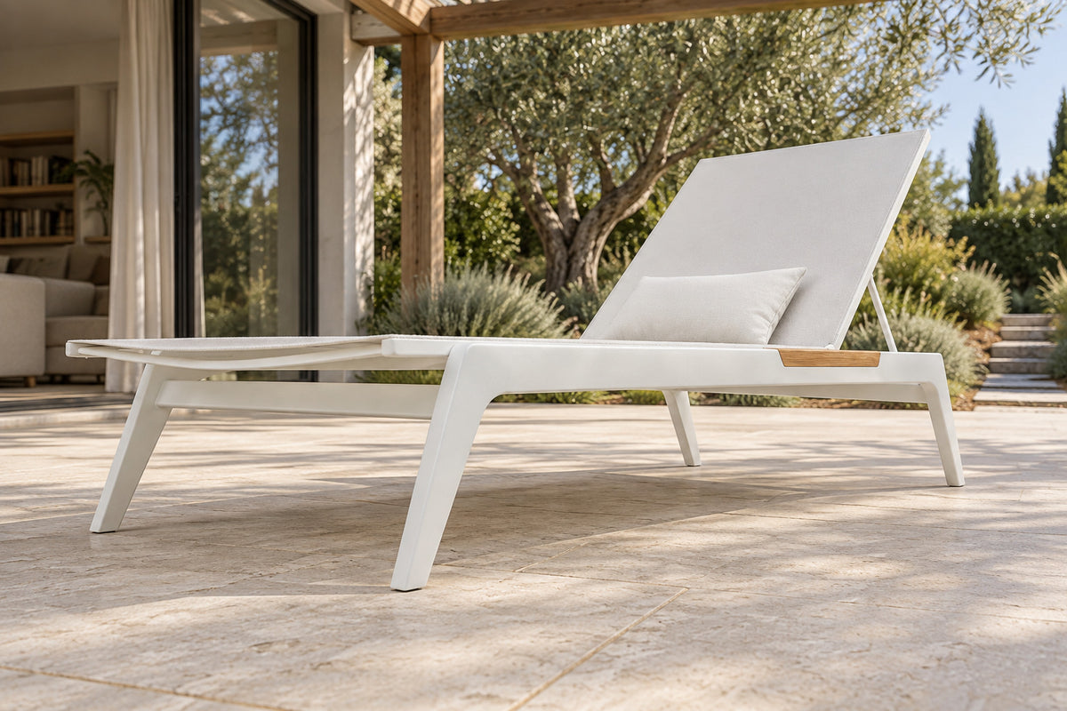 Lido Sun Lounger, low near-side-profile lifestyle view