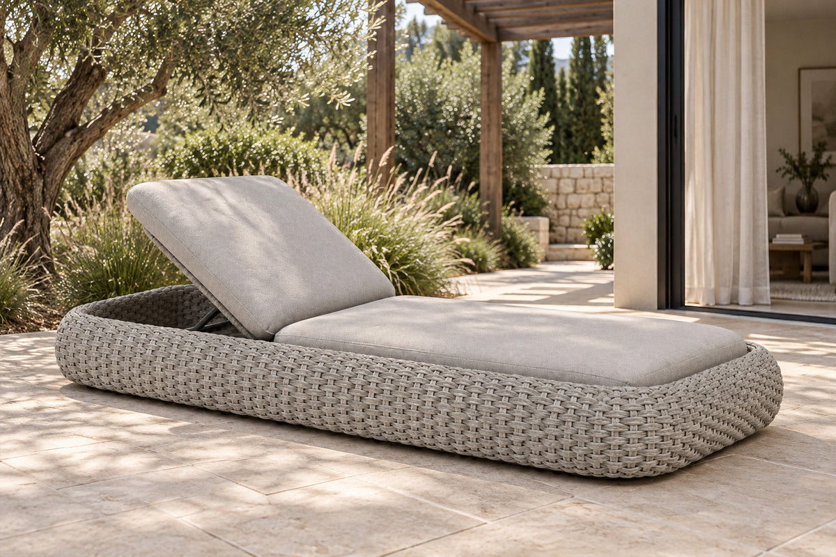 Sabbia Sun Lounger, low near-side-profile lifestyle view