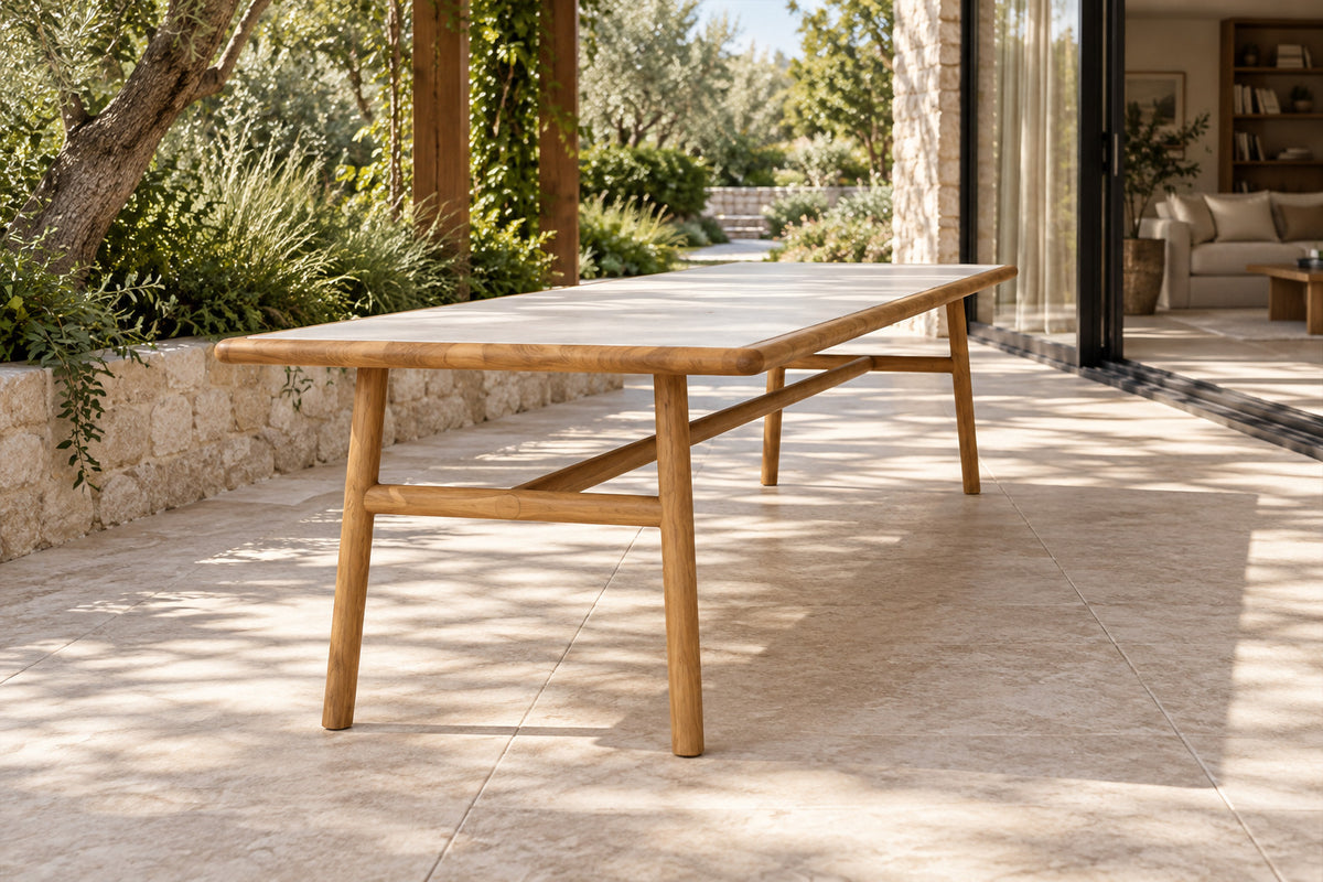 Sintra Dining Table, low near-side-profile lifestyle view