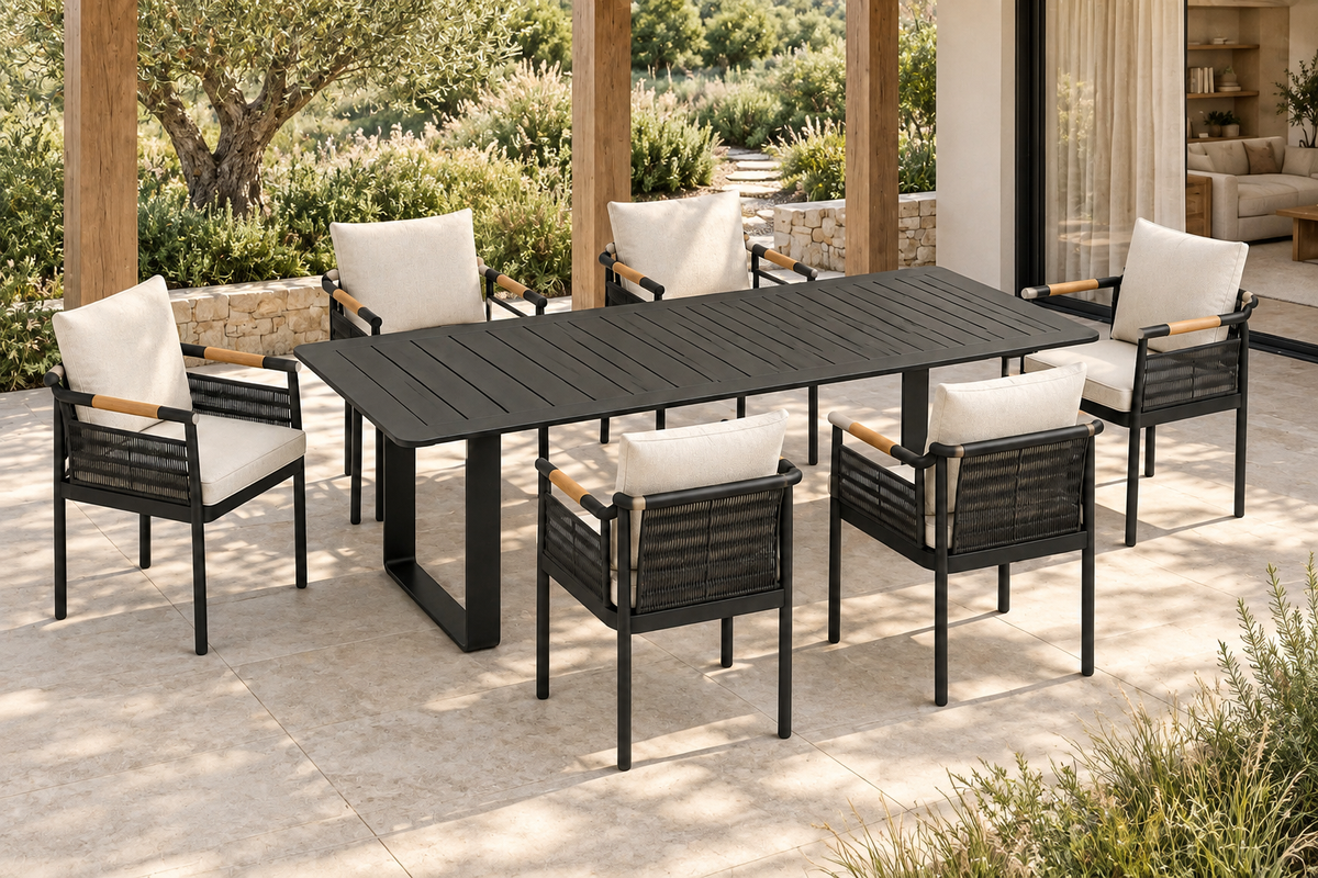 Lifestyle view: Zenia aluminium outdoor dining set beside a garden and furnished home