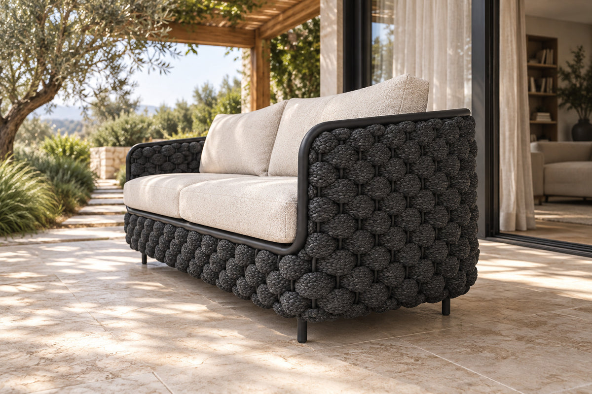 Bodrum Two-Seat Sofa, low near-side-profile lifestyle view