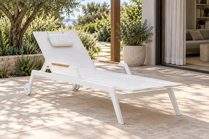 Faro Sun Lounger, front-right three-quarter lifestyle view