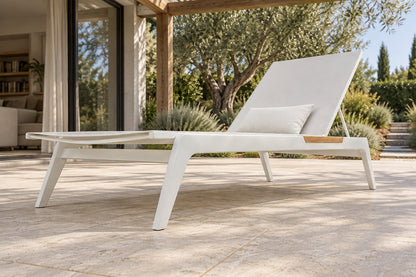 Lido Sun Lounger, low near-side-profile lifestyle view