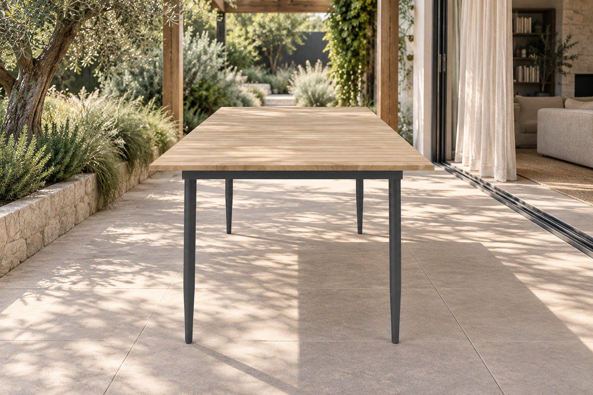 Naxos Dining Table, low near-side-profile lifestyle view