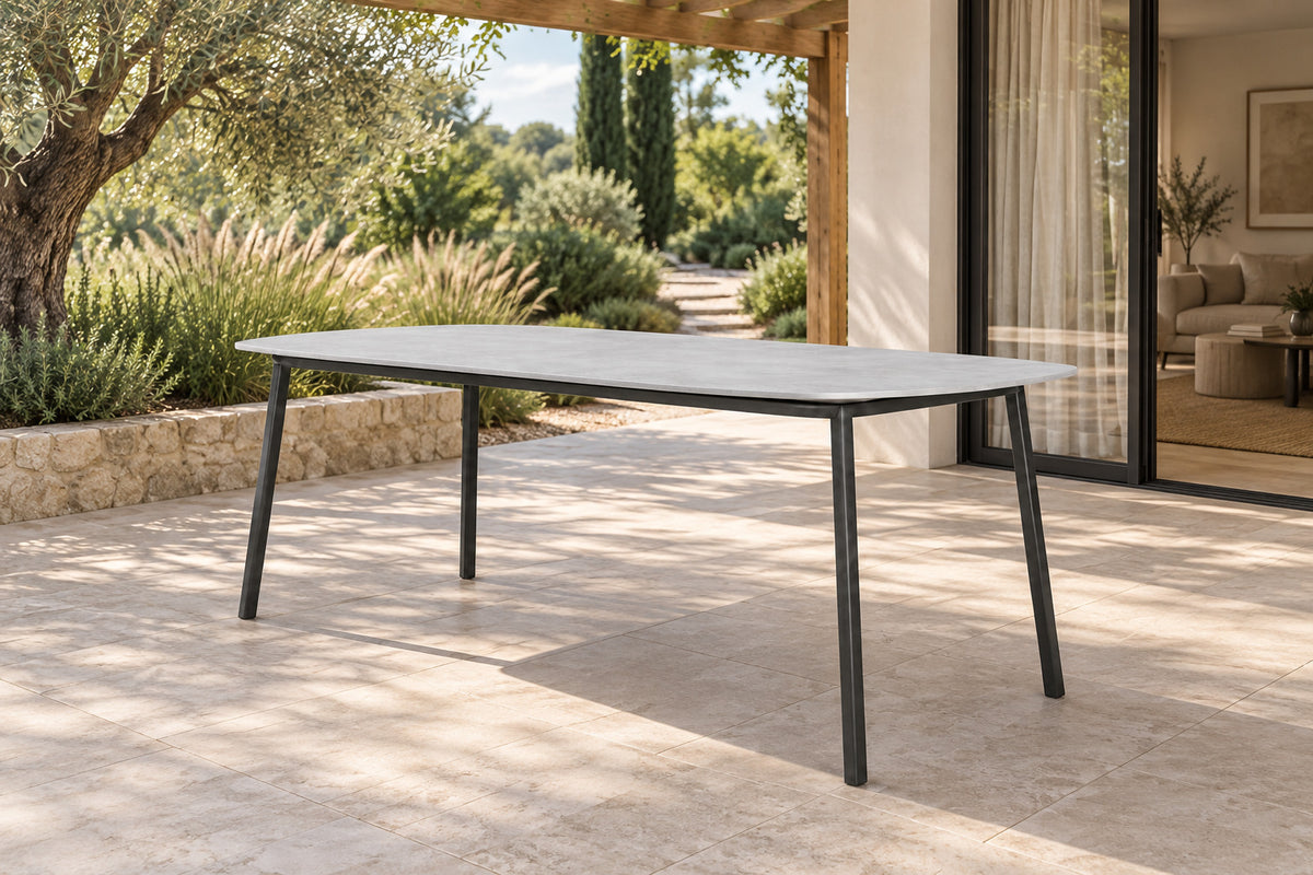 Otranto Dining Table, front-right three-quarter lifestyle view