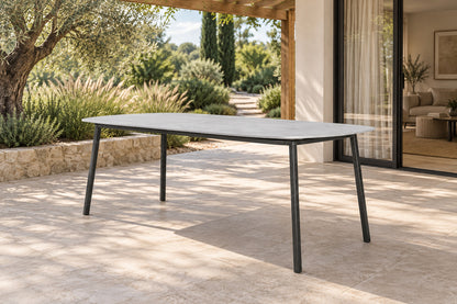 Otranto Dining Table, front-right three-quarter lifestyle view