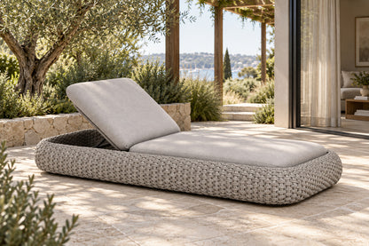 Sabbia Sun Lounger, front-right three-quarter lifestyle view