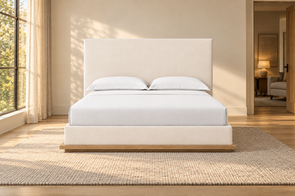 Lifestyle view: Montecito fabric panel bed in a warmly lit furnished bedroom