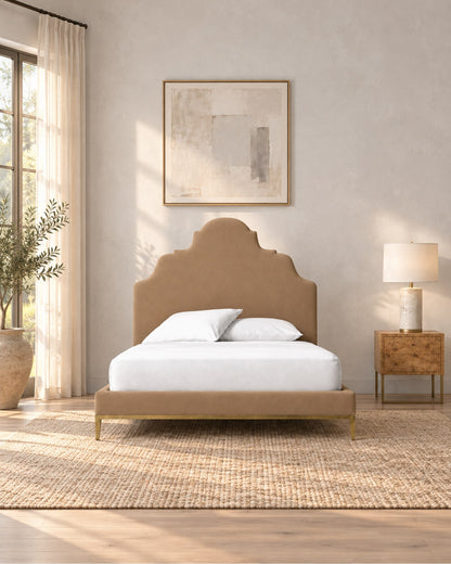 Camilla Upholstered Bed — Aged Brass in a styled setting