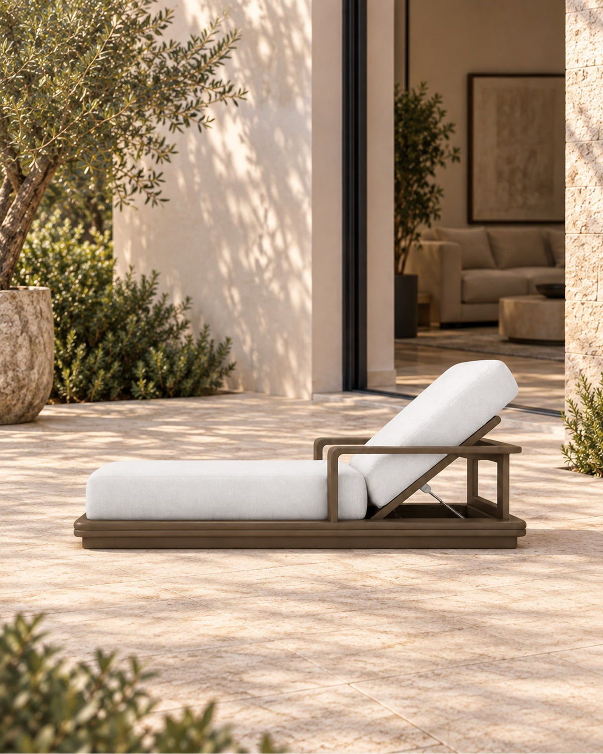 Grace Sun Lounger in Aluminium in a styled setting