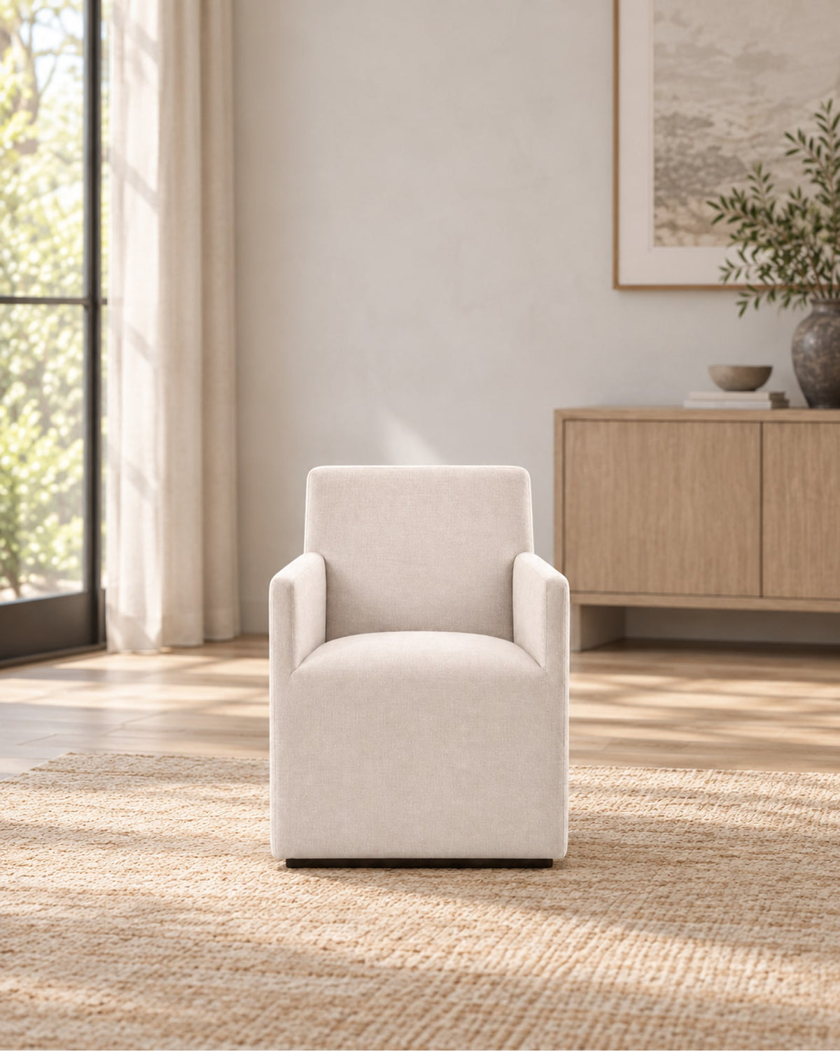 Ellison Track Arm Fabric Dining Armchair in a styled setting