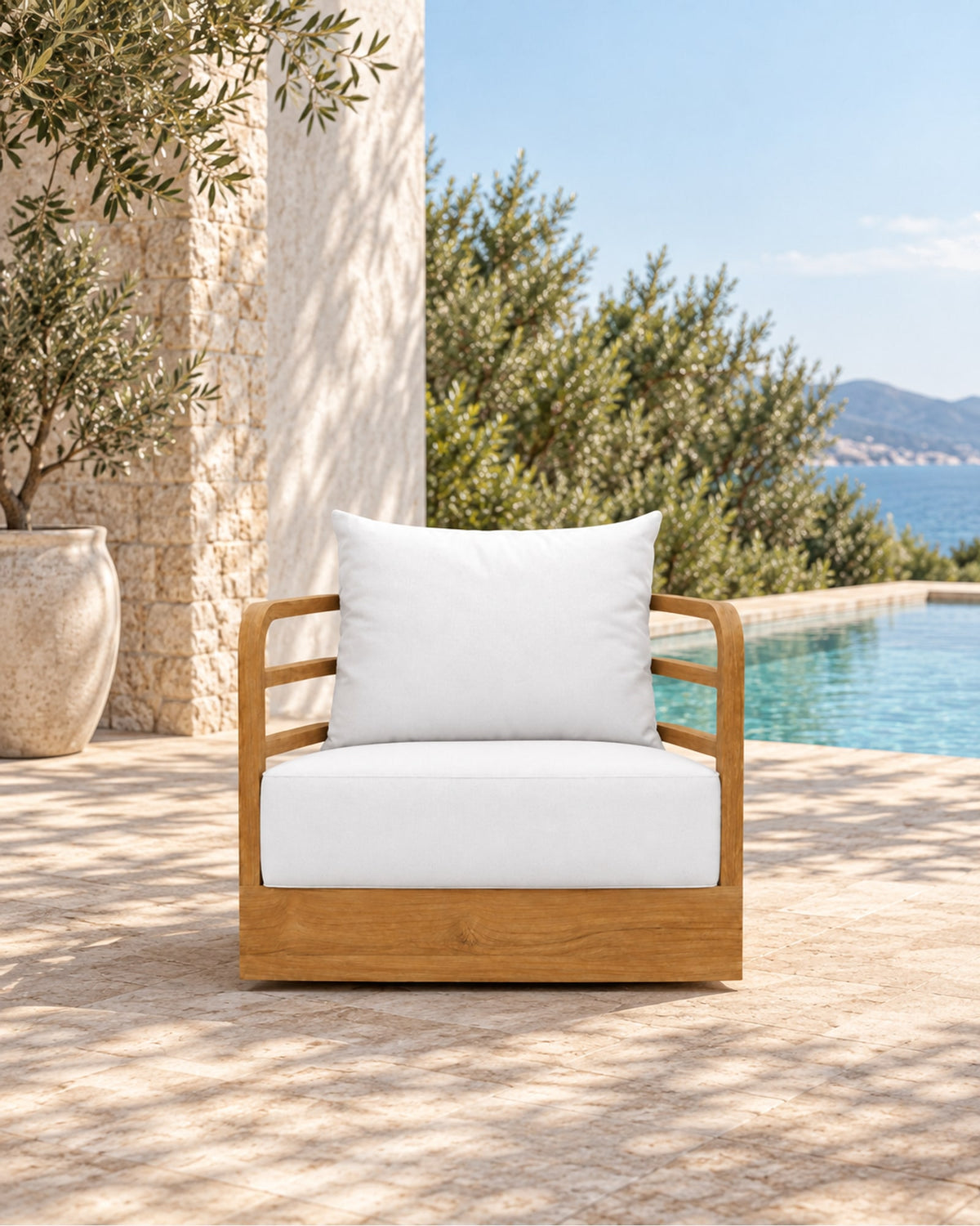Vela Lounge Chair in Teak in a styled setting