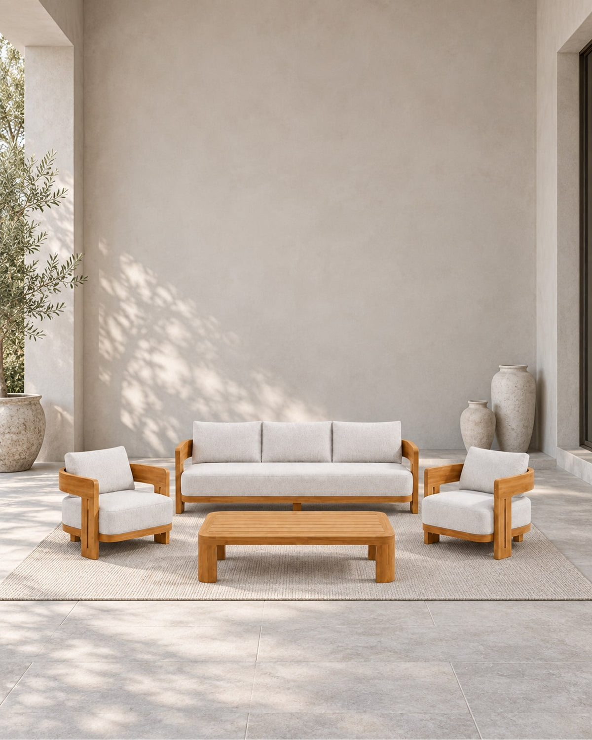 Serein Outdoor Sofa Set in Teak in a styled setting
