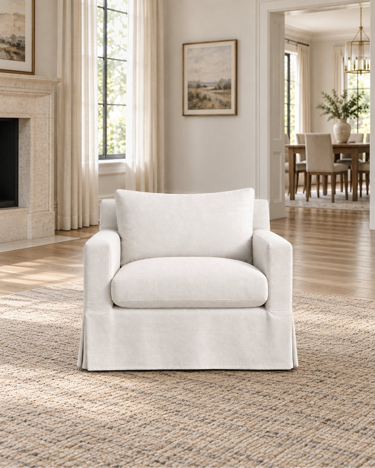Belgian Slipcovered Track Arm Swivel Chair in a styled setting