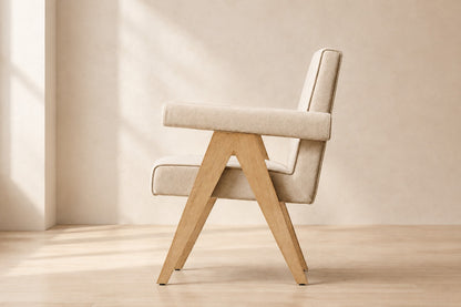 Jakob Fabric Dining Armchair, photographed in a quiet interior