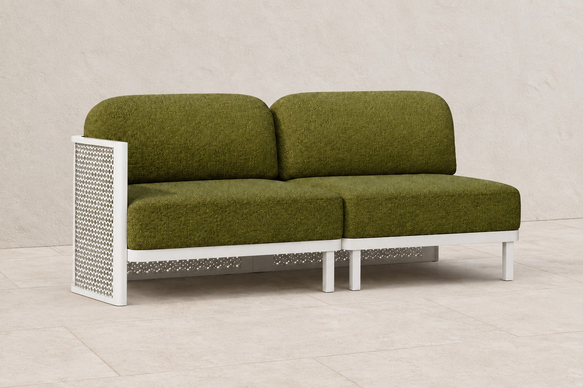 Luna Modular Two-Seat in Aluminium, photographed in a quiet outdoor courtyard