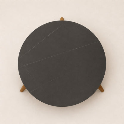 Marisol 70 cm coffee table with dark solid circular top and three timber legs, top view