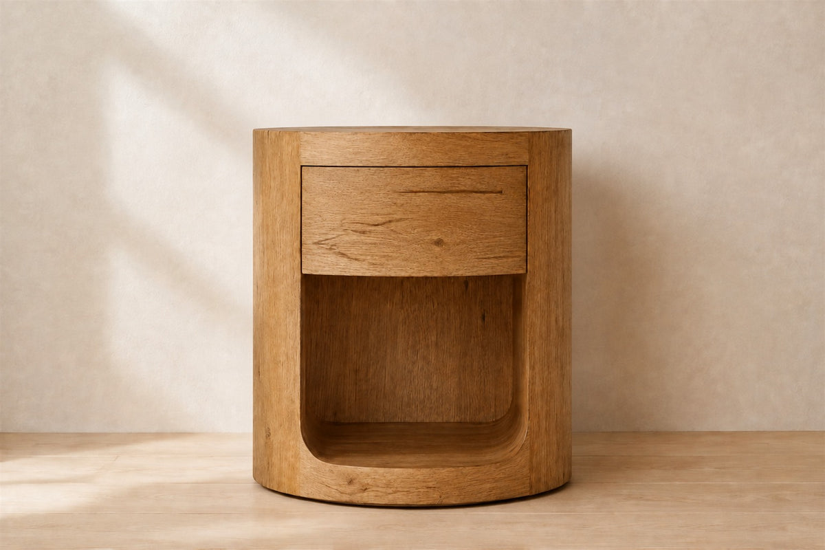 Oslo Round Nightstand, photographed in a quiet bedroom