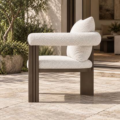 Ethereal aluminium dining chair, true left side profile on a furnished terrace