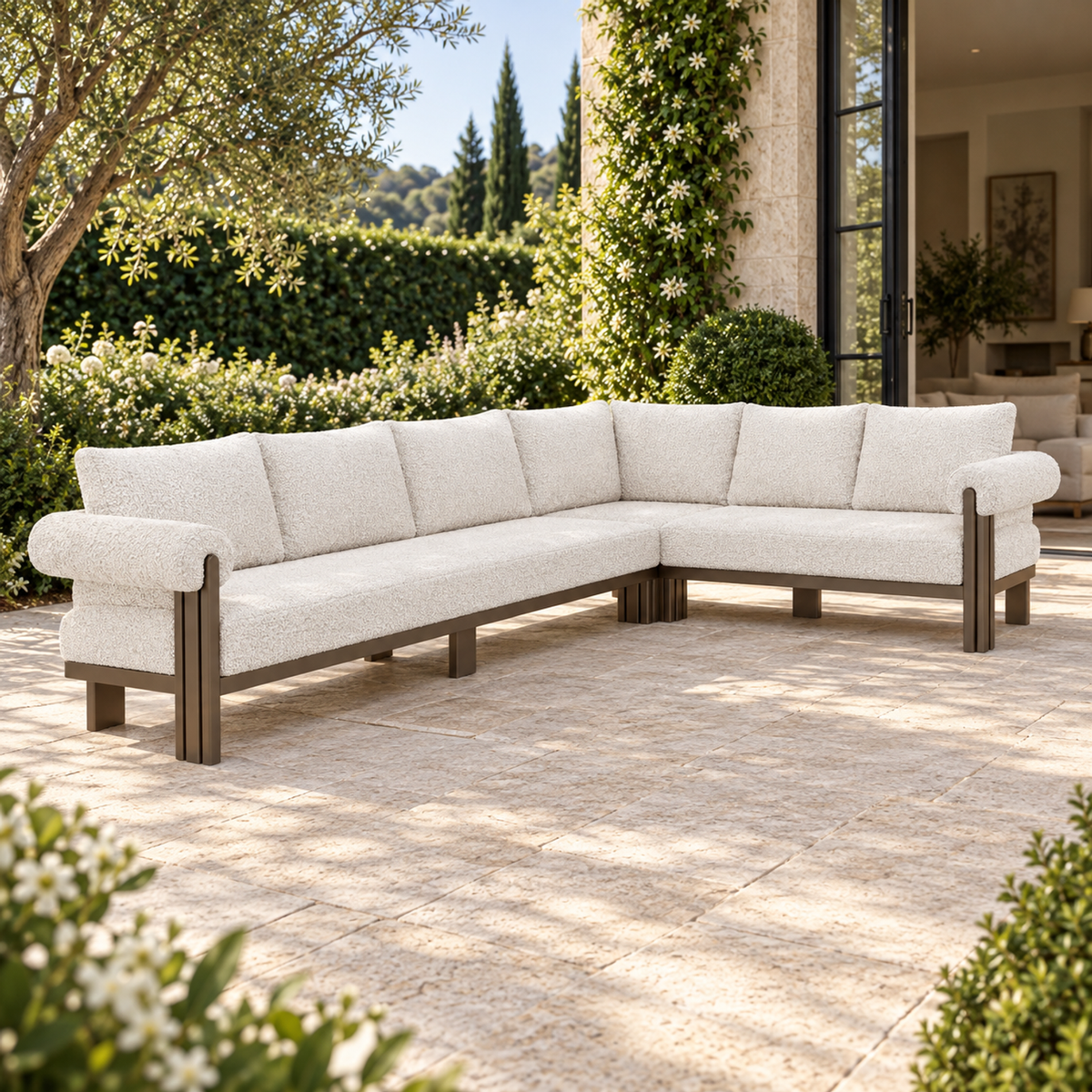 Lifestyle view: Ethereal L-Sectional in Aluminium, left three-quarter view beside a furnished garden home