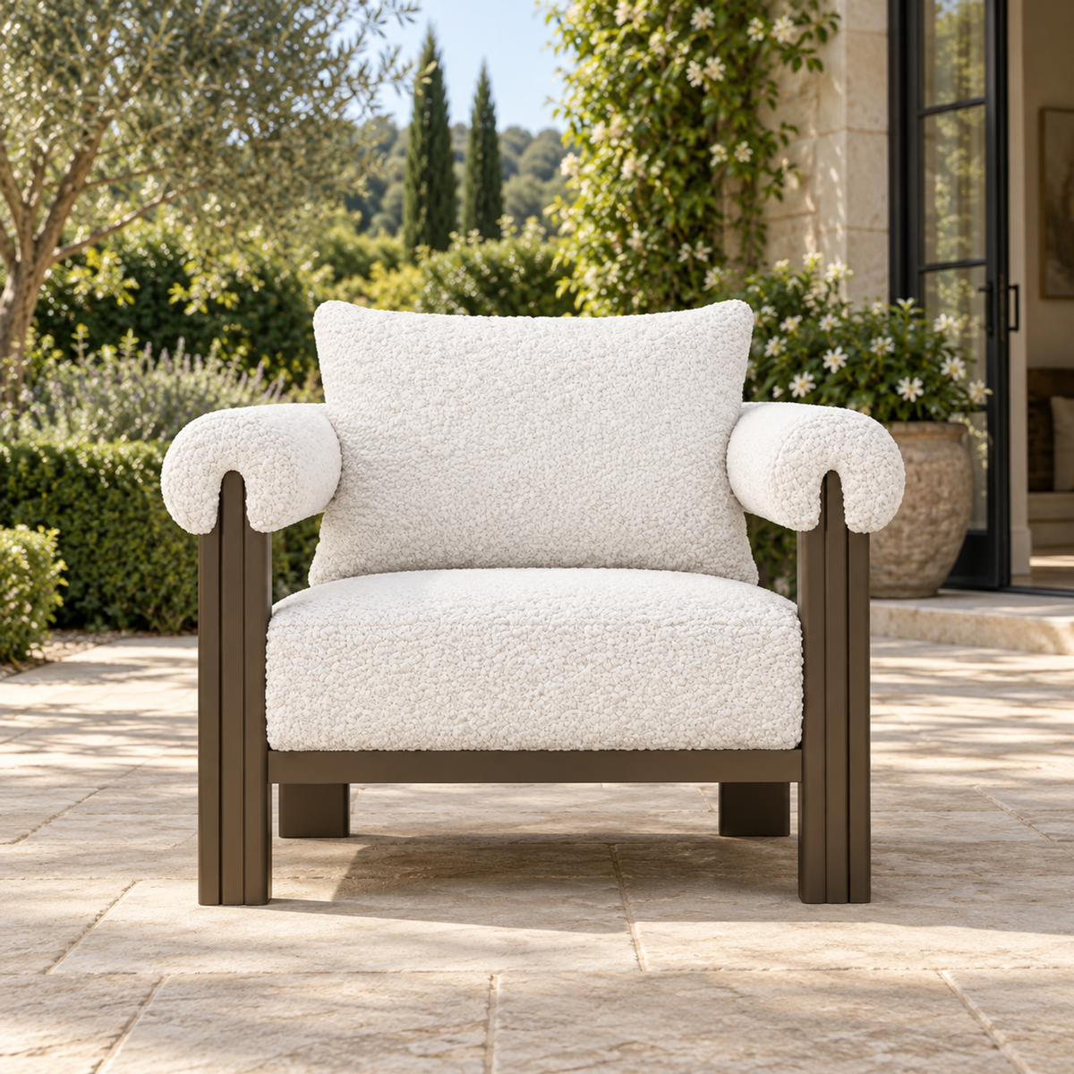 Lifestyle view: Ethereal Lounge Chair in Aluminium, straight frontal view on a planted home terrace