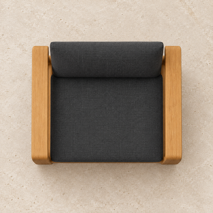 Grace teak dining chair, overhead view on a stone terrace