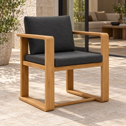 Grace teak dining chair, opposite diagonal beside a furnished terrace