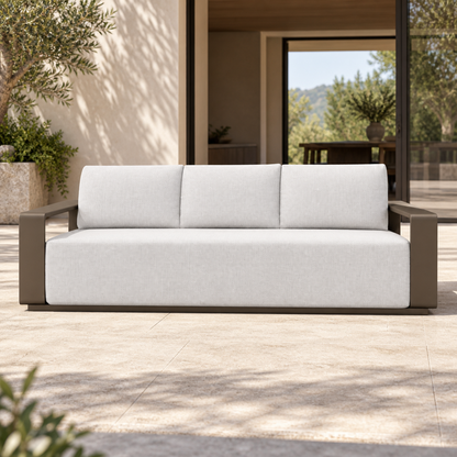 Grace aluminium sofa, straight front view on a home terrace