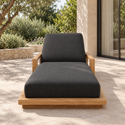 Grace Sun Lounger in Teak, centered foot-end view on a home terrace