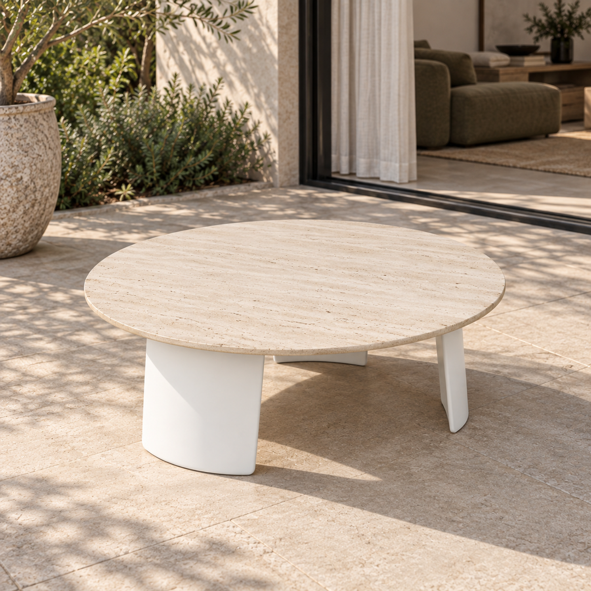 Lifestyle view: Luna Coffee Table in Aluminium, photographed on a furnished outdoor terrace