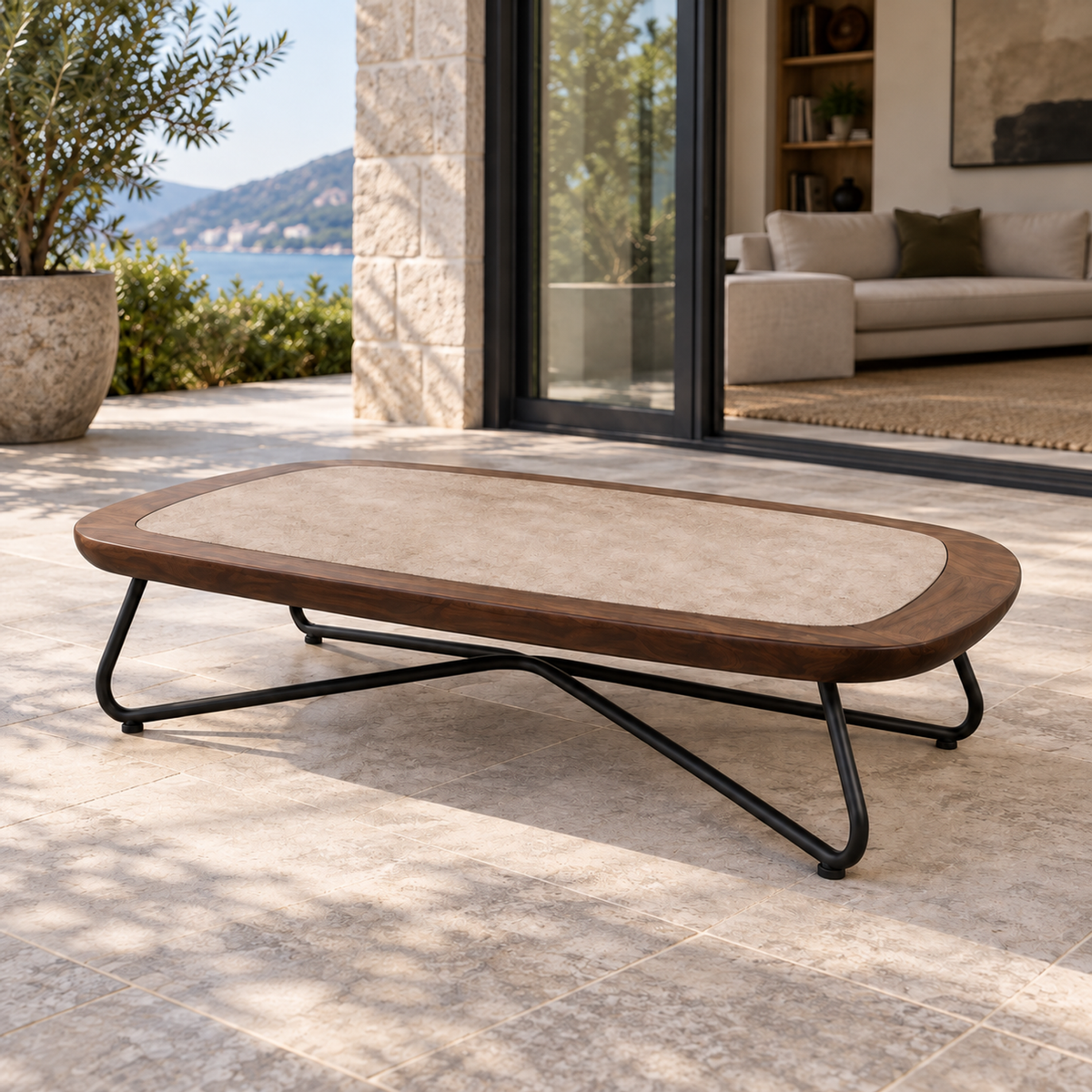 Lifestyle view: Positano Coffee Table, photographed in a quiet outdoor courtyard