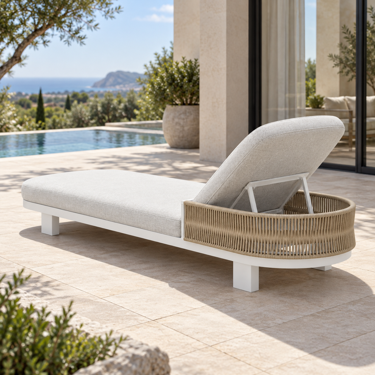 Lifestyle view: Ripple Reclining Sun Lounger in Aluminium, rear diagonal on a pool terrace
