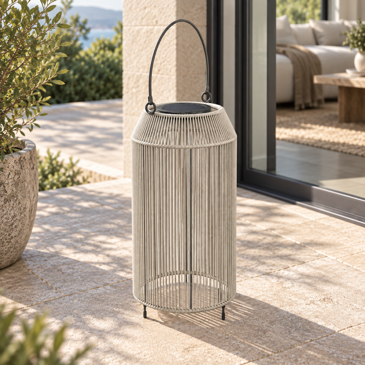 Lifestyle view: Solano Solar Lantern, Tall, photographed on a furnished home terrace
