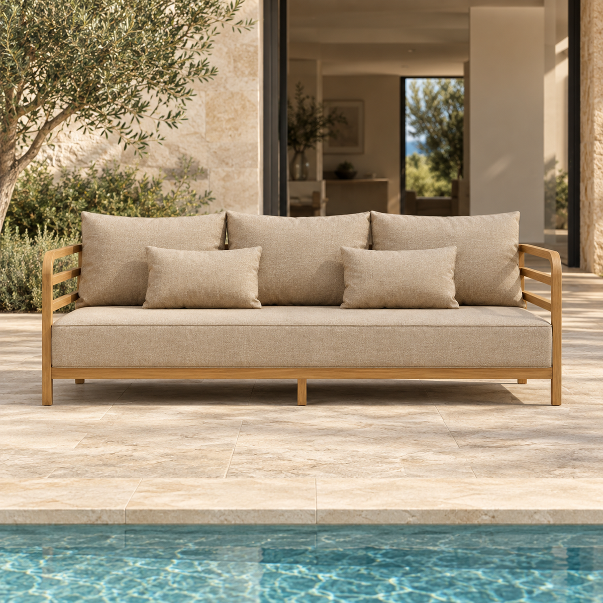 Lifestyle view: Vela teak sofa, front view beside a furnished home