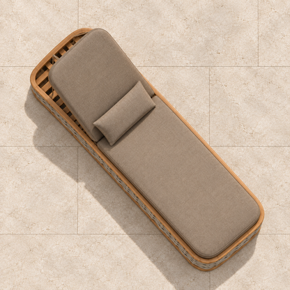 Vela woven teak sun lounger, overhead view on a stone terrace