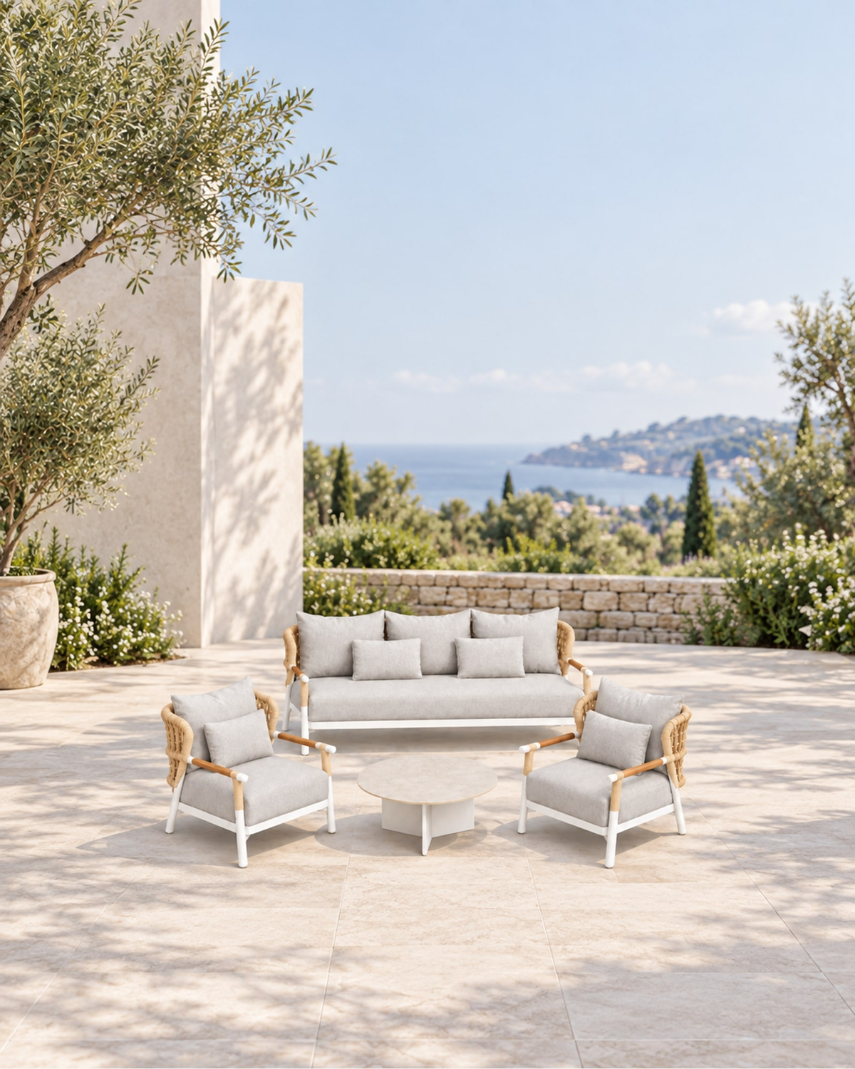 Vela Outdoor Sofa Set in Aluminium in a styled setting
